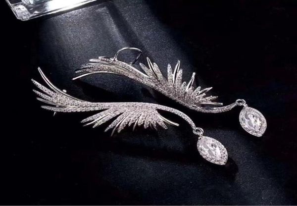 

hezekiah s925 silver wing earrings personality women039s earrings dance party superior quality earrings feather5609473, Golden