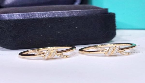 

18k gold knot ring classic designer ring men and women wedding gift factory whole luxury jewelry8167312, Slivery;golden
