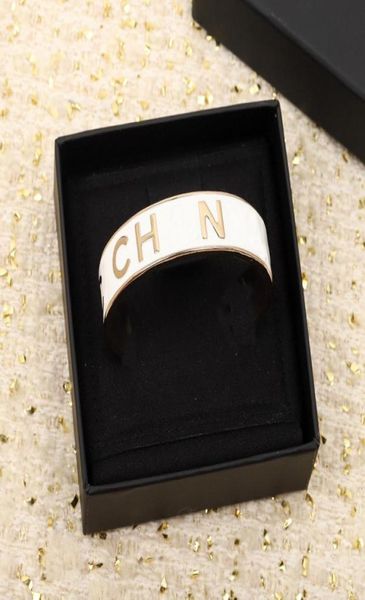 

excellent quality charm opened bangle bracelet middle wide with black and white enamel design words color have box stamp ps33236252737