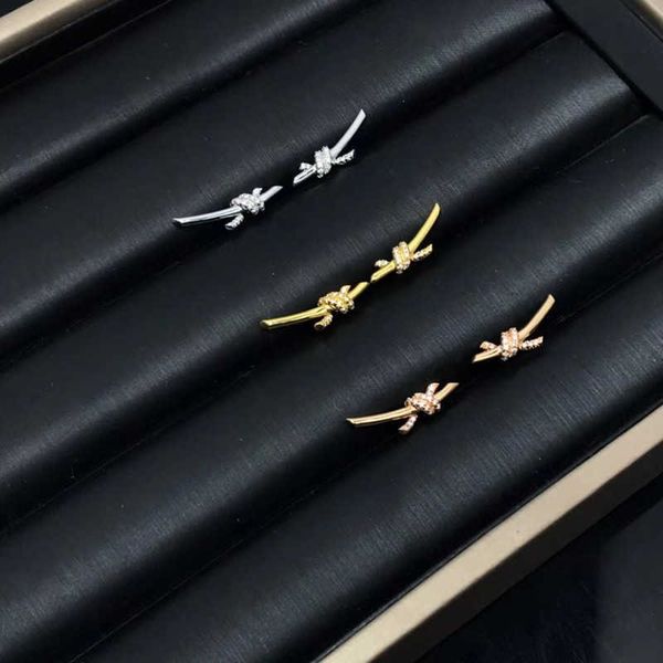 

original designer silver valley ailing earrings with the same style high end light luxury rope knot rose gold cross twist, Golden