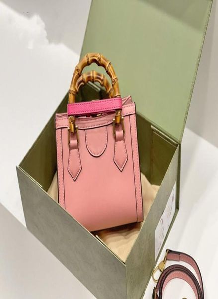 

2021 bag handbag pink fashion color exquisite versatile bamboo handle with buckle classic personality highend temperament style1006990, Black;red