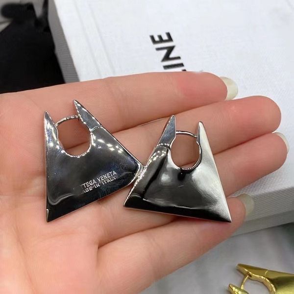 

dainty modern statement light gold luxury design exaggerated classic girlfriend design small triangle design earrings heavy earrings, Golden