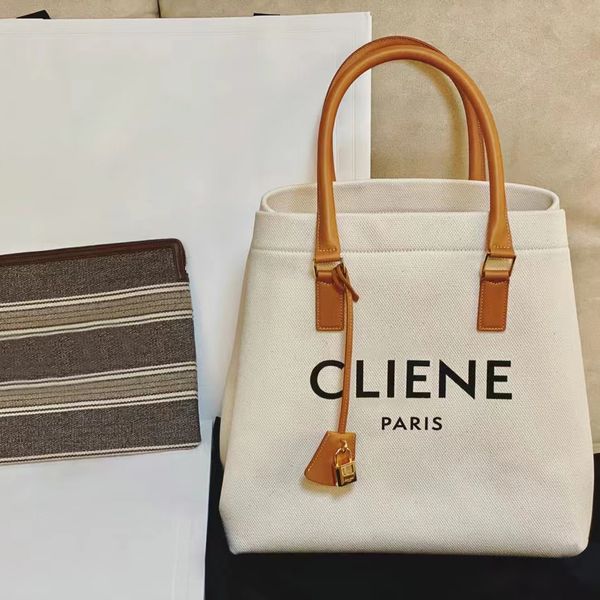 

fashion handle summer triomphe canvas bag luxury designer raffias womens beach bag travel luggage mens shoulder bag handbag nylon tote cross