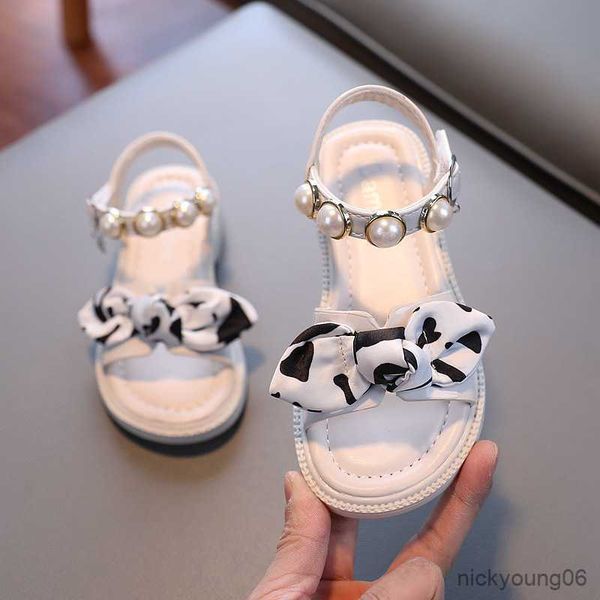 

sandals girls sandals princess shoes 2023 summer new bow soft bottom non-slip children's beach shoes fashion flat sandals r230529, Black;red