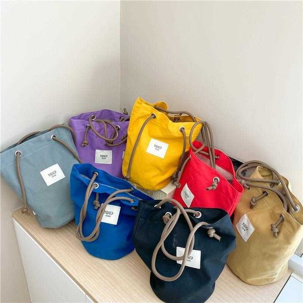 

ins korean style childrens handbag spring and summer bucket bag shoulder baby travel concave shape coin purse fashion, Red;black