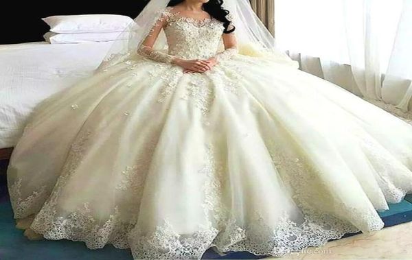 

romantic dubai arabic wedding gowns sheer jewel neck laceapplique long sleeves bridal gowns 2017 glamorous cathedral train weddin7242175, White