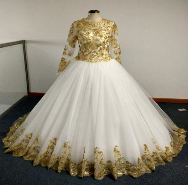 

2016 colorful bridal gowns with champagne gold sequins appliques and sheer long sleeves princess ball gown chapel train real weddi7160683, White