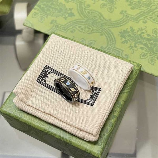 

designer jewelry bracelet necklace ring kmx. black white ceramic bee planet twist inlaid phnom penh couple ring, Silver