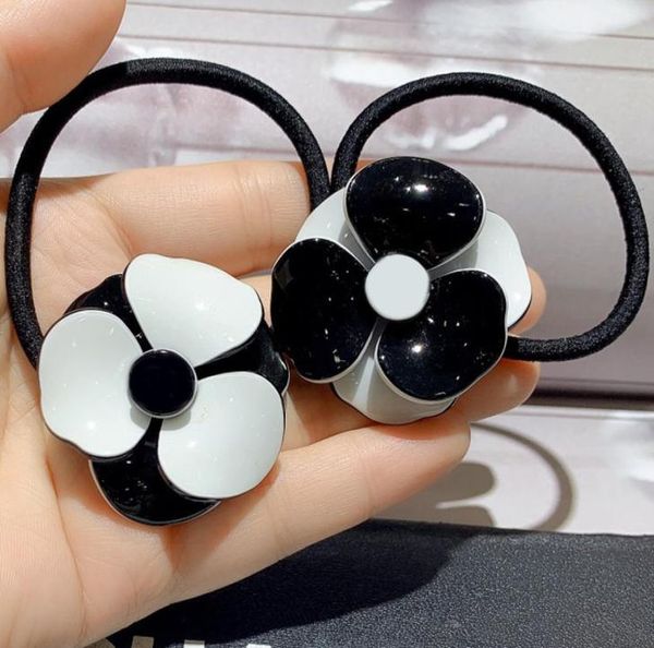 

fashion black and white acrylic flower hair rope rubber bands hairpins popular headwear jewelry in european and american countries1640737, Pink