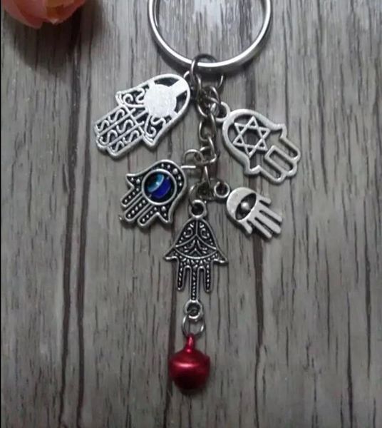 

50pcs fashion diy keychain25mm key ring turkey blue evil eyekabbalah fatima hamsa hand bell charms keyring decorative bag gift3885891, Silver