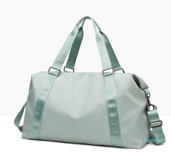

hand yoga bag female wet waterproof large luggage bag short travel bag 502822 with brand logo5339680