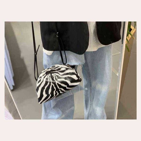 

evening bag shoulder bags hand deigner luxury pure and hand clutch pure dumpling zebra cloud crobody pouch 220329
