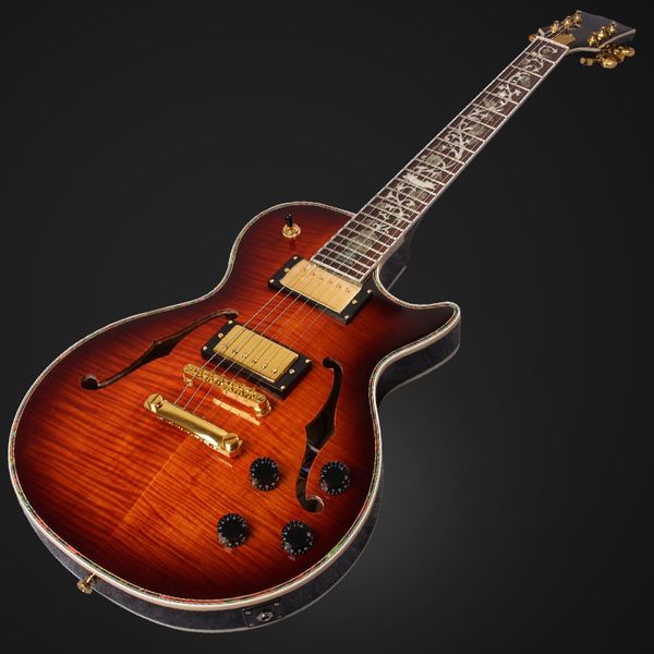 

ustom electric guitar with red tiger flame hollow body, mahogany fingerboard, ing
