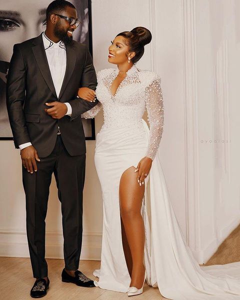 

2023 luxury mermaid wedding dresses african high neck lace appliques pearls beads overskirts side split illusion long sleeves vestidos de no, White