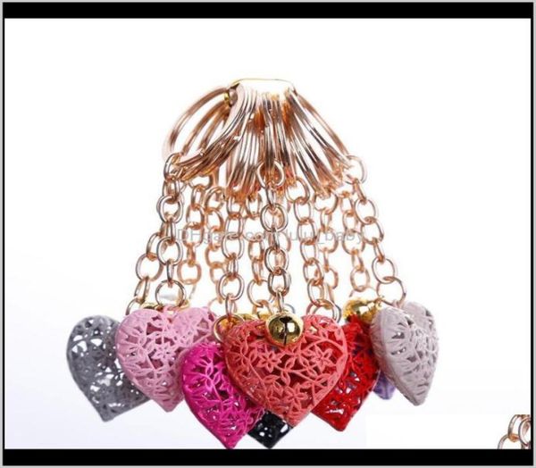 

aessories20pcslot whole hollow heart fashion charm cute purse bag pendant car keyring chain ornaments gift keychains t200804 6405499, Silver