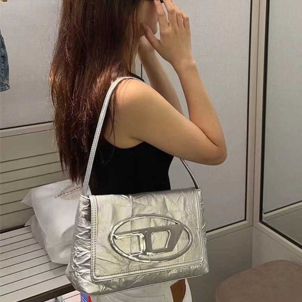 

designer bag suitcase and dinner bag women's summer new high capacity dingdang one shoulder underarm end small group silver handheld ti