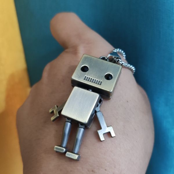 

retro robot warrior pendant necklace having a matching chain, Silver