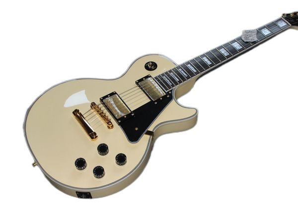 

6 string electric guitar with two pickups gold hardware black pickguard