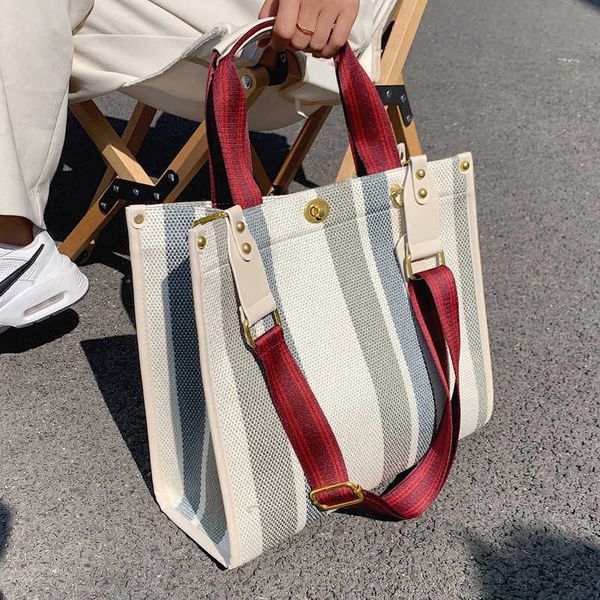 

summer new fashion single shoulder portable women's bag messenger stripe color matching women's bag high capacity tote bag