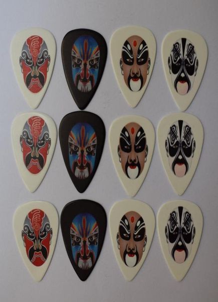 

12pcs 071mm new popular beijing opera masks rock band musical plectrums guitar picks6675475