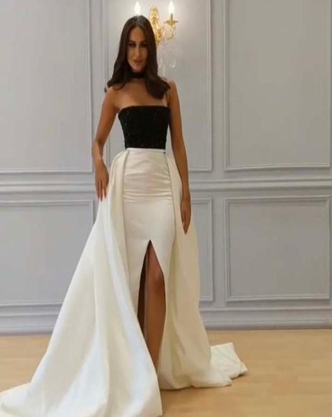 

arrival black and ivory high collar beaded collar sleeveless slit sheath prom dresses with overskirt8619192
