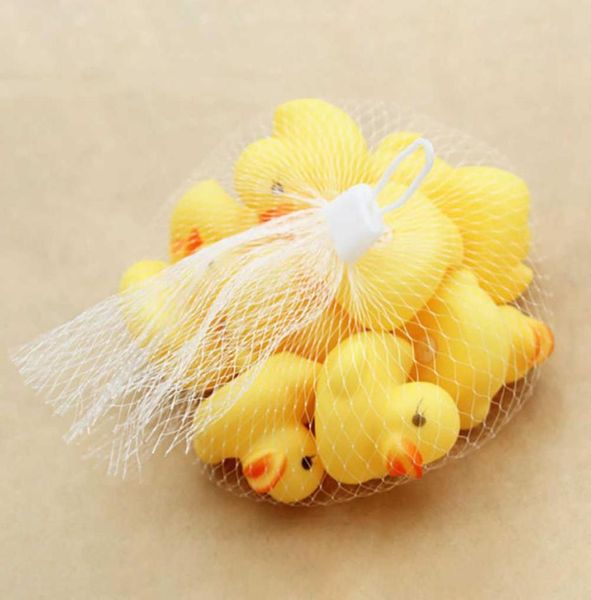 

100 pcs rubber duck yellow duckie squeezing call baby shower water toys whole children birthday favors kid039s tub bathroom3672125
