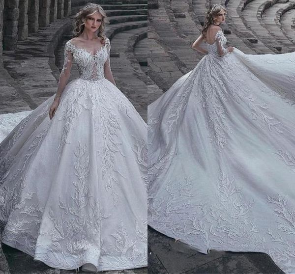 

2019 luxurious long sleeve sheer neck ruffle applique lace wedding dresses hollow zipper back long tail bridal gown ship5072699, White