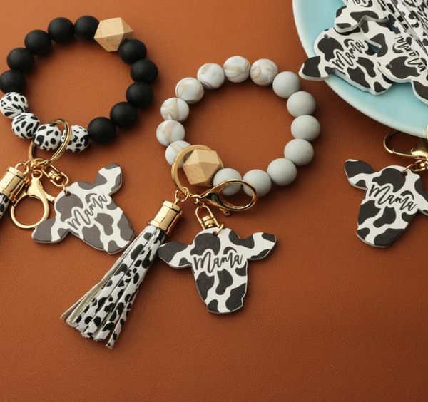 

silicone beads key chain for keys colorful wristlet bracelet jewelry milch cow pu tassel charm car key ring charms whole7804912, Red;brown