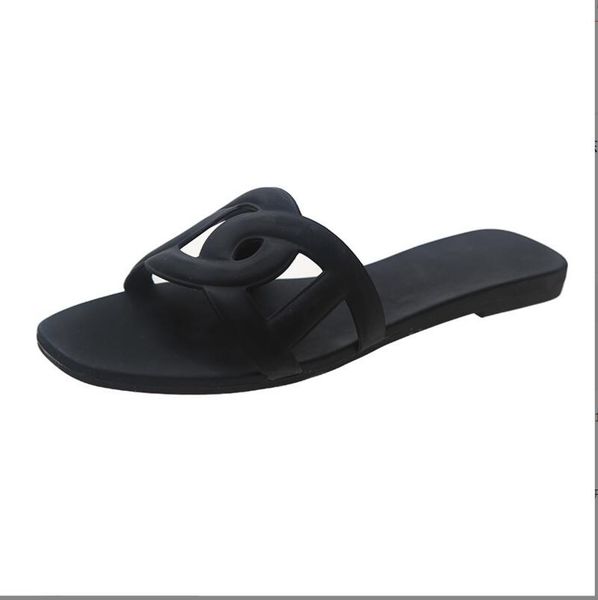 

designer slippers sliders slides sandals woody flat mule the maison's h signature adorns the inner sole the easy slip-on design makes t, Black