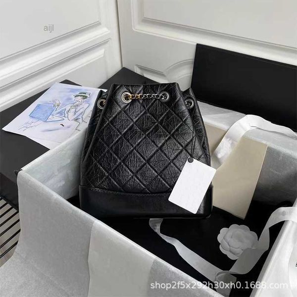 

xiaoxiangfeng new original leather cowhide lingge backpack wandering bag gold silver chain crossbody drawn bucket women's
