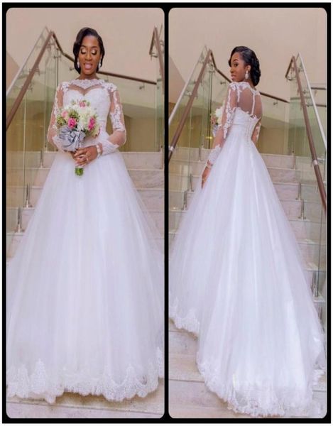 

long sleeve wedding dresses 2020 a line lace bridal gonws appliques lace sweep train dubai illusion sheer bridal gowns8582236, White