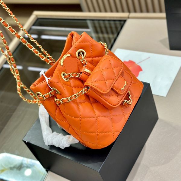 

orange lambskin leather women designer backpack bags with mini flap coin purse gold metal hardware matelasse chain turn lock string shoulder