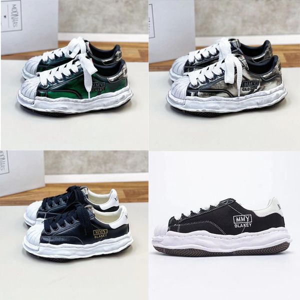 

casual shoes dissolving madness maison mihara yasuhiro mmy canvas lowcut sneaker mens platform womens white black red grey sneakers