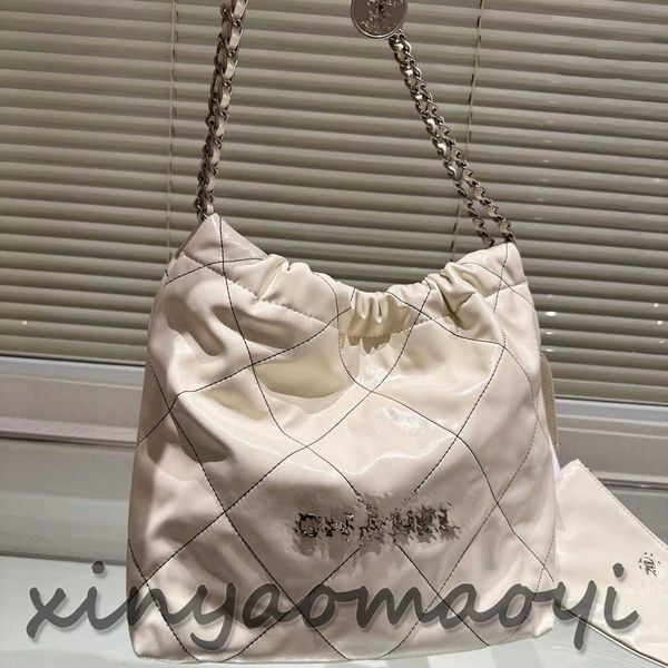 

classic designer leather tote bag women's french shoulder bag fashion luxury brand small garbage bag ivory white and silver decorated w