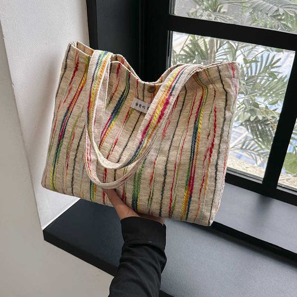 

small french canvas stripe women's bag new fashion commuter handheld shopping bag casual simple bucket bag