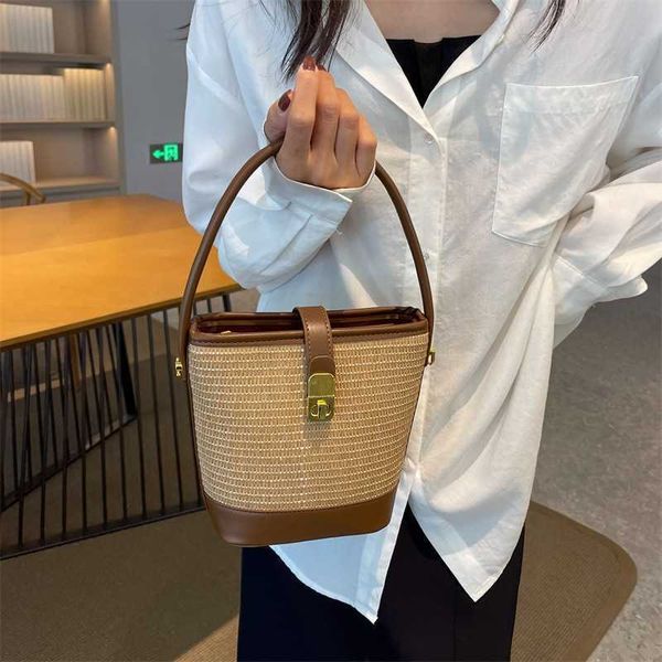 

new evening bags this year's popular niche straw woven women's summer fashionable and versatile crossbody portable bucket 230704