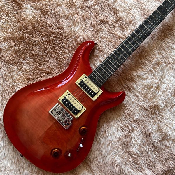 

prs electric guitar with solid beige tremolo bridge, neck and body, 1
