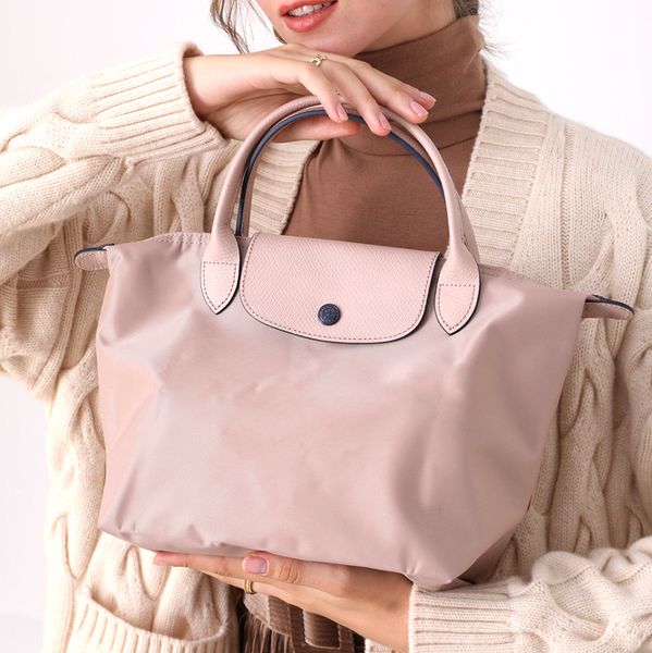 

nylon tote clutch duffle shopper bags luxurys designer summer dumpling cross body hand bag men women large capacity fashion trunk shoulder t