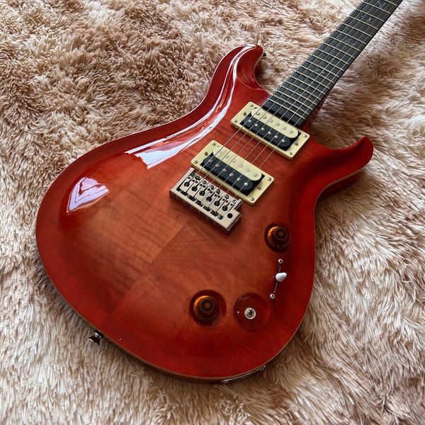 

prs electric guitar with solid beige tremolo bridge, neck and body, 1
