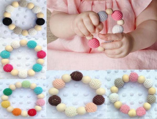 

20pcs baby play gym chew crochet round wooden beads candy ball knit inside wood shower gift bed toys newborn teether trottie rattl7481835