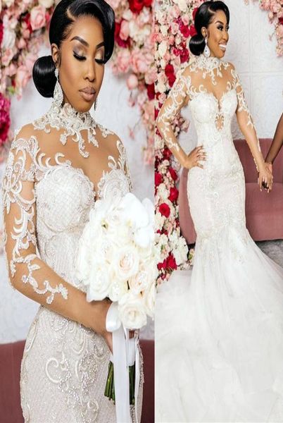 

2021 plus size arabic aso ebi lace beaded mermaid wedding dress high neck sheer neck long sleeves vintage bridal gowns dresse6057976, White