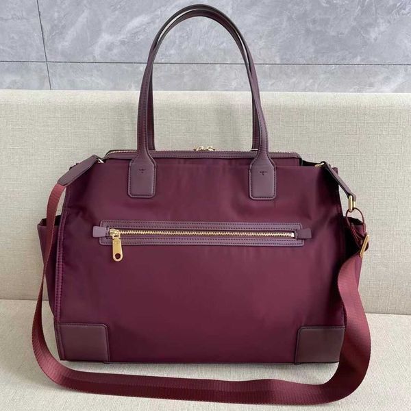 

newly launched tb nylon single shoulder bag with detachable shoulder strap can be used as a portable single shoulder messenger armpit bag mi