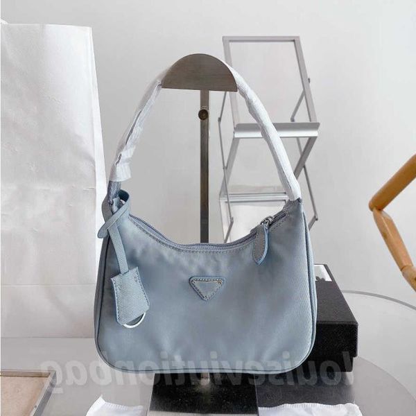 

lm40156v 2023 luxurious fashion re-edition 2005 nylon woman luxurys men designers bags lady womens mens crossbody tote hobo shoulder purses