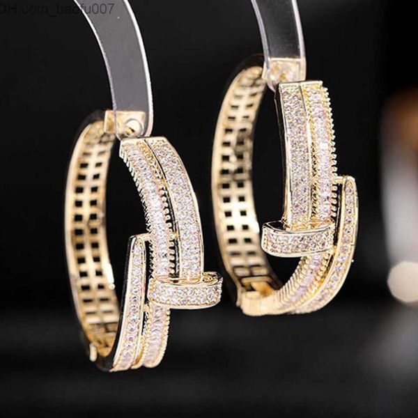 

charm zlxgirl luxury brand nail mirco paved cubic zirconia stud earrings women's wedding party earrings premium jewelry earrings couple, Golden