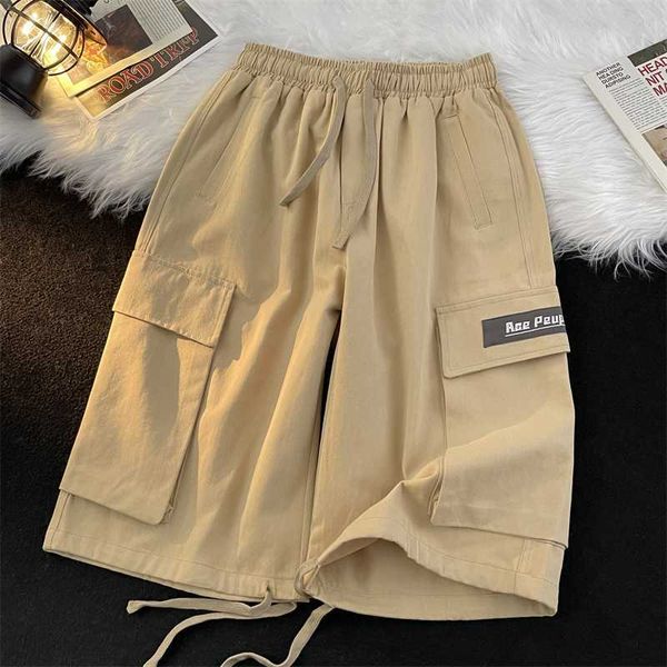 

2023 new summer shorts for men's trendy high street retro half pants loose versatile large pocket casual straight leg capris l230705, White;black