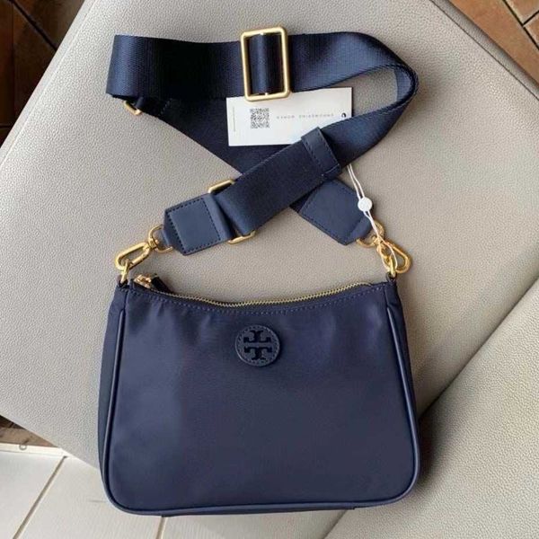 

the new tb messenger bag is made of versatile nylon material super lightweight with wide shoulder straps advanced practical and lazy