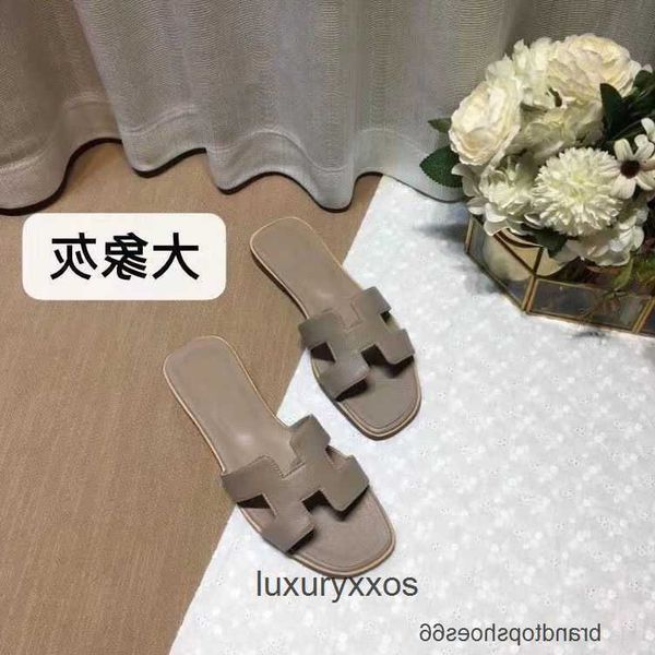 

2023 h hermz sandal oran slippers oasis girl designer sandals beach summer flat heel leather sheepskin women's shoes q438