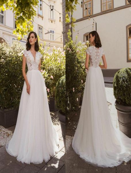 

2020 bohemian aline wedding dresses v neck capped sleeves lace appliques bridal gowns button back sweep train garden wedding dres5702292, White