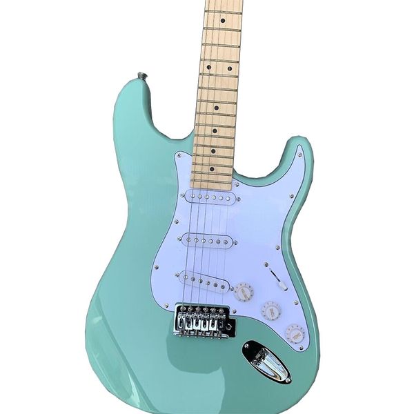 

factory customization surfing green electric guitar has a good feel and sound