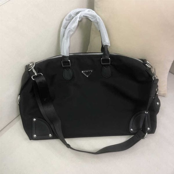 

handbag factory clearance wholesale 2023 new family travel bag large capacity tote men's and women's shoulder msenger